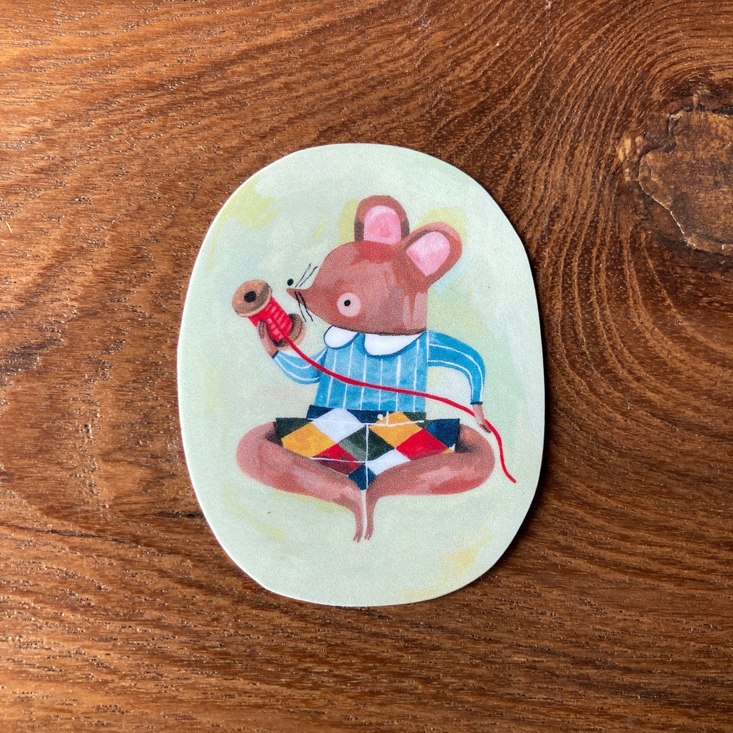 Mouse and the red thread sticker